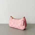 COACH Teri Shoulder Bag In signature canvas/Gold/Powder Pink
