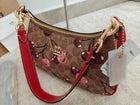 Model CY694 Teri Shoulder In Signature Canvas With Cherry Print CY694